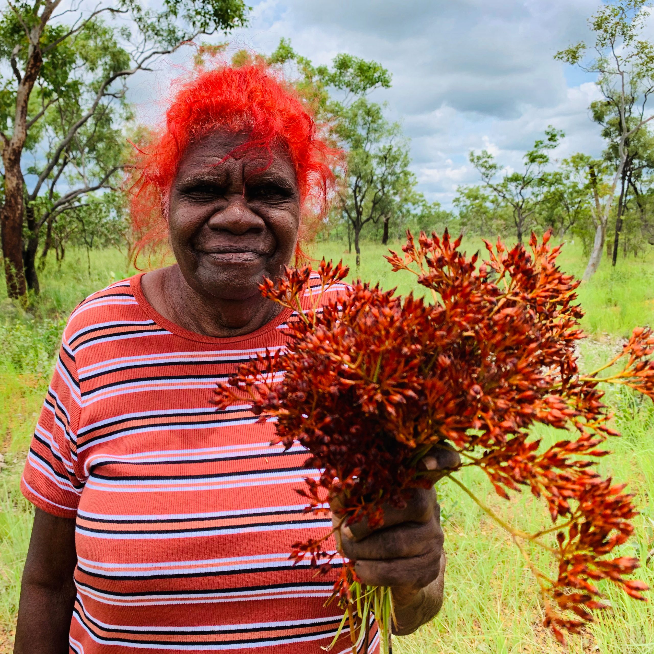 Hazel Ponto holding bush flowers